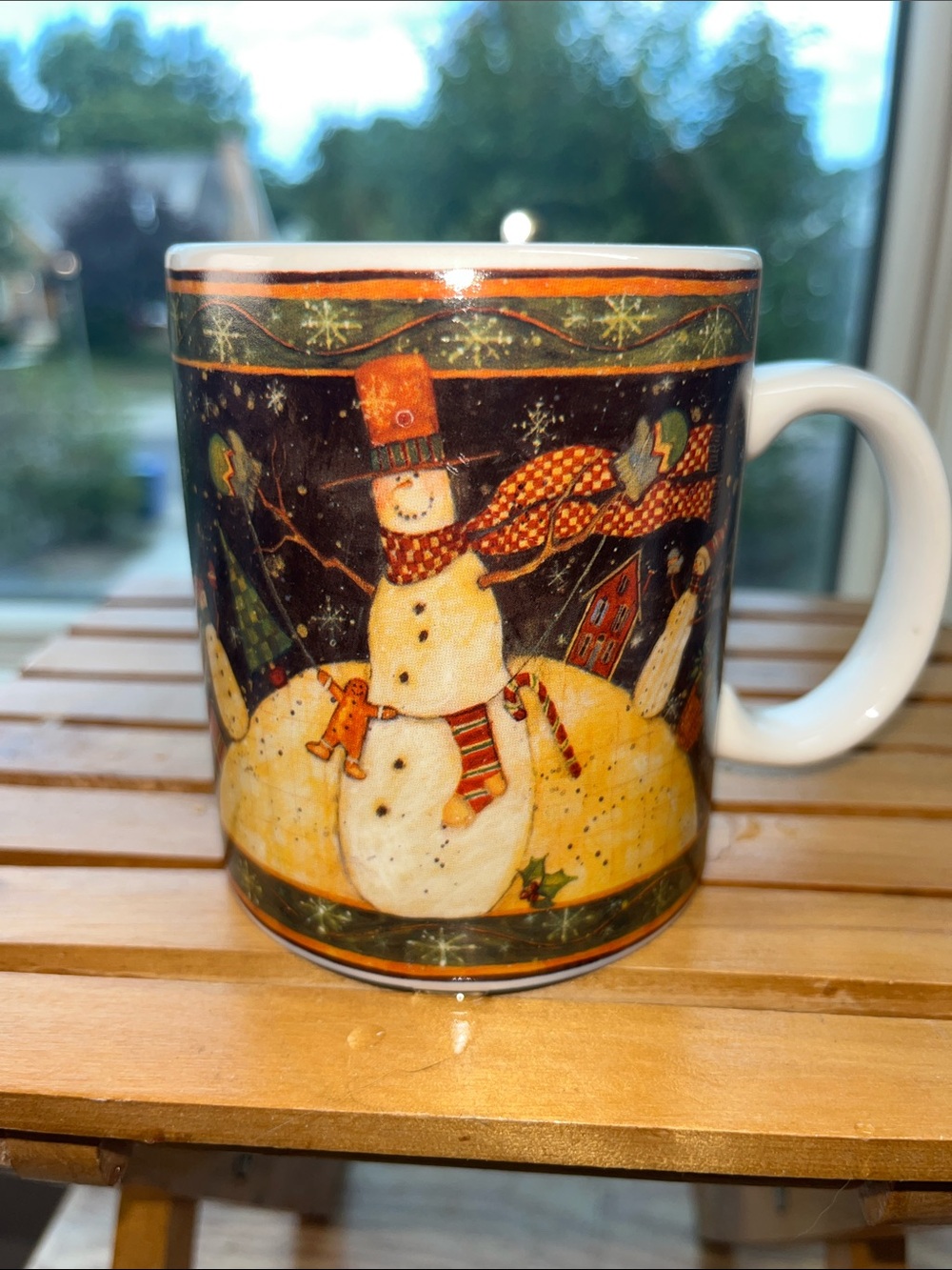 Holiday Snowman Ceramic Mug by Susan Winget